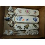 A box of Victorian and later ceramic door furniture, to include finger-plates, keyhole covers,