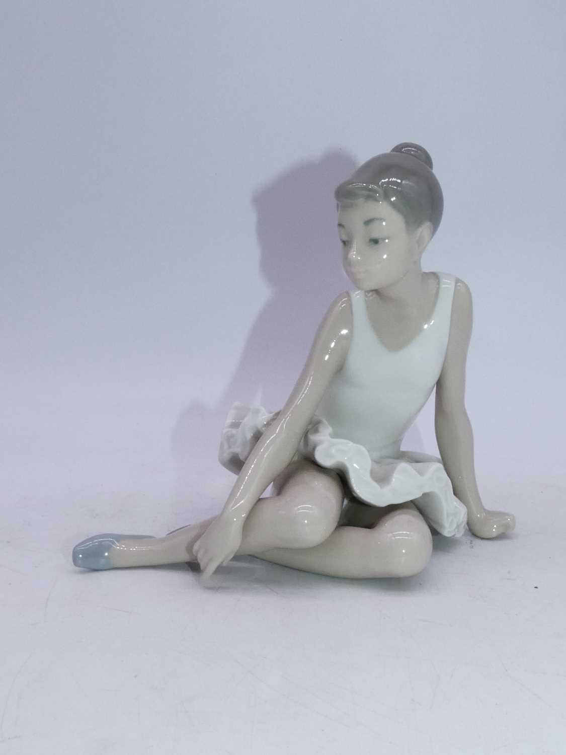 A Lladro Spanish porcelain figure of a ballerina, in reclining pose, having printed mark verso; - Image 4 of 4