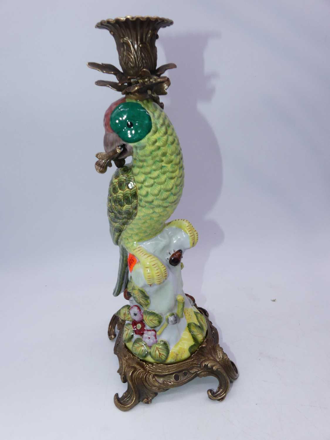 A pair of modern reproduction continental porcelain candlesticks each in the form of a parrot on a - Bild 3 aus 3