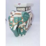 A reproduction ceramic plant stand in the form of an elephant, h.35cm