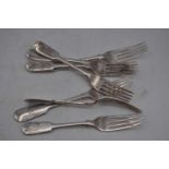 A matched set of seven early 20th century silver Fiddle pattern dessert forks, 14oz