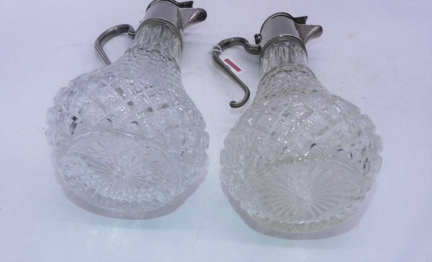 A pair of claret jugs, each having a hobnail cut body with plated mounts, h.30cm - Bild 2 aus 3