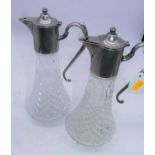 A pair of claret jugs, each having a hobnail cut body with plated mounts, h.30cm