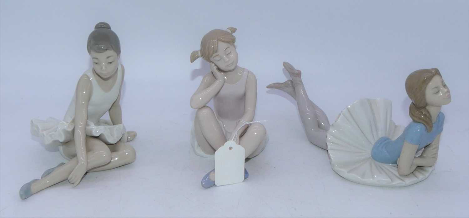 A Lladro Spanish porcelain figure of a ballerina, in reclining pose, having printed mark verso;