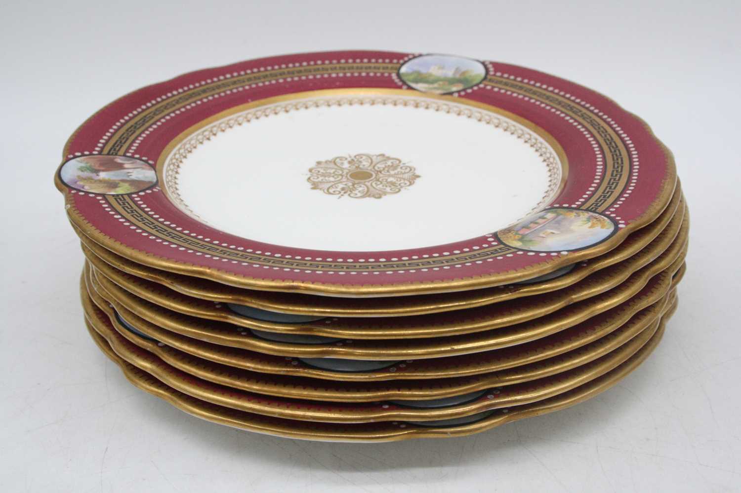 A Victorian part dessert service, each piece on a white ground with puce and Greek Key border, - Image 7 of 9