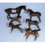 A collection of six various Beswick ponies and foals, all in brown gloss finish (6)