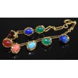 A Victorian style gilt metal and semi-precious set bracelet together with a pair of paste set ear