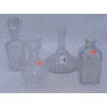 A modern decanter, having a star-cut base, hobnail cut body, and mushroom stopper, h.22cm;