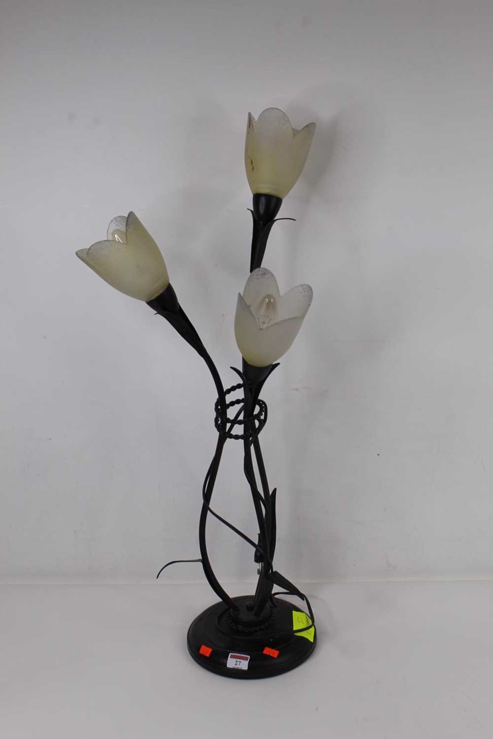 A contemporary continental painted metal table lamp, in the form of three flowers with frosted glass