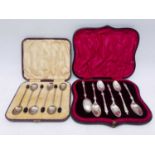 A set of six George V silver coffee bean spoons, Sheffield 1928, cased; together with a set of six
