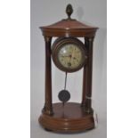 A 19th century Portico clock, the dial showing Roman numerals, having pineapple finial and