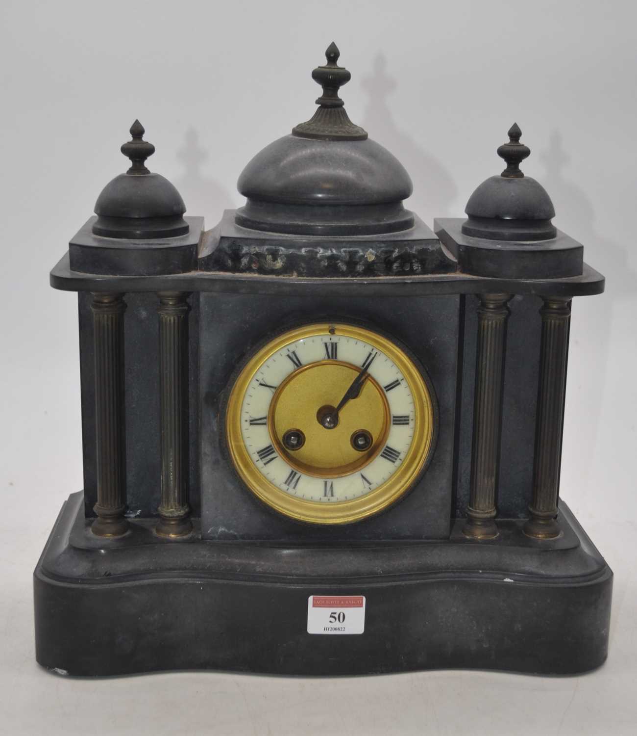 A Victorian black slate 8-day mantel clock, of architectural form, the enamelled chapter ring