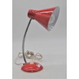 A 1970s red painted angle poise desk lamp, 32cm high