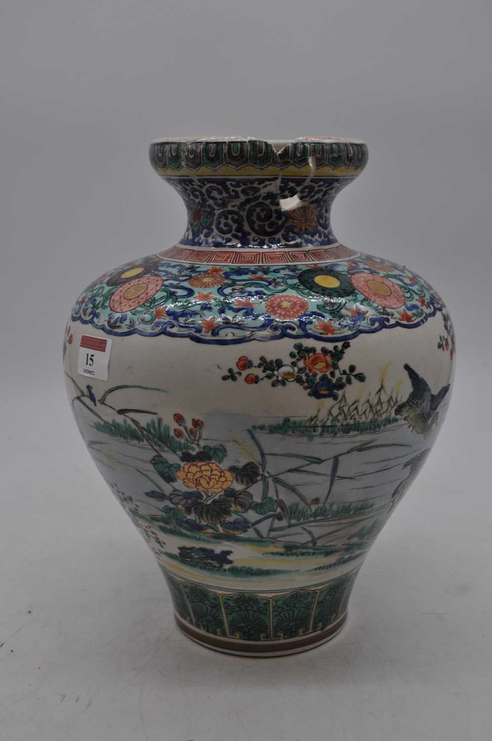 An early 20th century Japanese earthenware vase, enamel decorated with birds amongst flowers, - Bild 2 aus 3