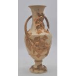 A Royal Dux earthenware vase, relief decorated with trailing vines, pink triangle to underside,