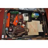 A box containing a collection of photography equipment to include vintage cameras, Halina, Ilford,