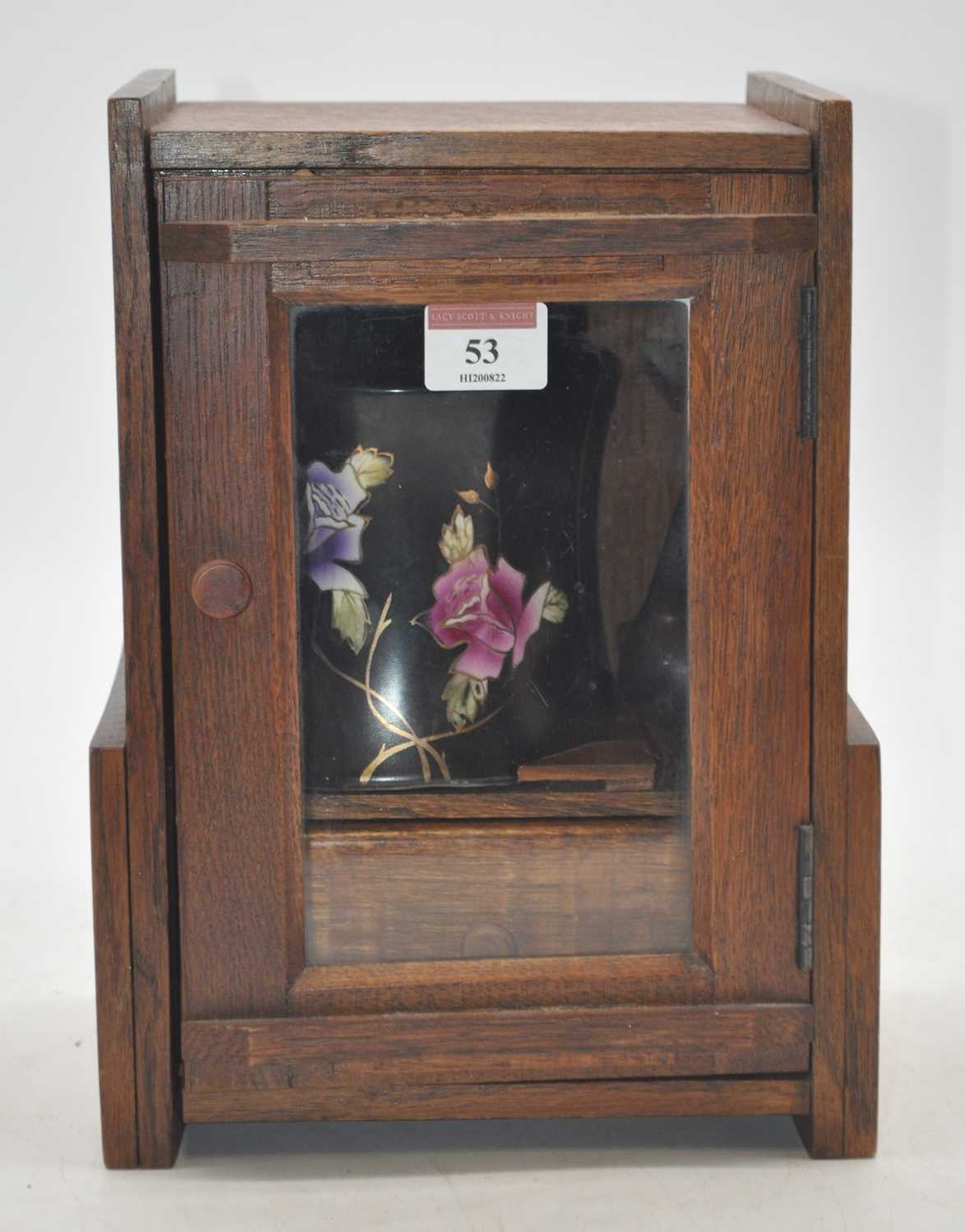 An early 20th century oak cased smoker's cabinet, height 28cm