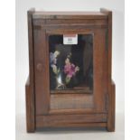 An early 20th century oak cased smoker's cabinet, height 28cm