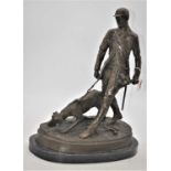 A bronze figure of a huntsman and his dog, signed Aldo Vitaleh, and mounted upon a polished