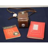 A Rolleiflex Compur-Rapid boxed camera, in leather case; together with a Rollieflex and Rolliecord