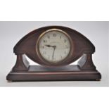 An early 20th century boxwood strung mahogany mantel clock, the dial showing Arabic numerals and