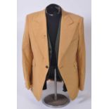 Steve Harley, a gentleman's yellow gabardine single breasted jacket, together with a green waistcoat