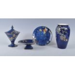 A collection of Art Deco Grimwades Royal Winton blue lustreware, to include; a Blackthorn pattern