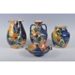 A collection of Art Deco Grimwades Royal Winton Sunburst pattern blue lustreware, to include; a