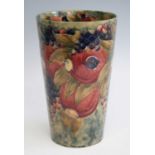 A large early 20th century Moorcroft Pomegranate pattern pottery vase made for Liberty & Co, of