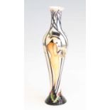 A contemporary Moorcroft Style of Season pattern vase, of slender baluster form, underglaze tube-