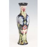 A contemporary Moorcroft Casablanca pattern vase, of baluster form, underglaze tube-line decorated