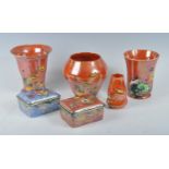 A collection of Art Deco Grimwades Royal Winton orange lustreware, to include; a Poppies pattern