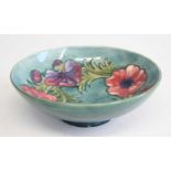 A Moorcroft Anemone pattern pottery footed table bowl, of circular form, underglaze painted and