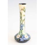 A contemporary Moorcroft Shakespeare Flowers pattern bottle vase, underglaze tube-line decorated