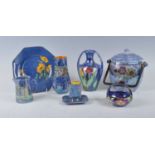 A collection of Art Deco Grimwades Royal Winton blue lustreware, to include; a Crocus pattern twin