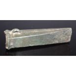 A Bronze Age copper alloy axe head, of typical tapering form with small loop to the top end,