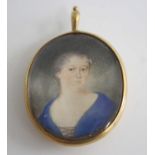 Early 19th century English school - bust portrait of a middle-aged woman wearing a blue dress,