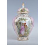 A 20th century Dresden porcelain vase and cover, decorated with alternating panels of figures and