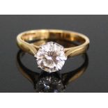 An 18ct yellow gold and platinum diamond single stone ring, comprising a round brilliant cut diamond