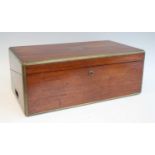 An early Victorian mahogany and brass bound campaign writing box, having sunken brass carry handles,