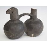 A black burnished pottery water vessel of double gourd form, the front section modelled as a