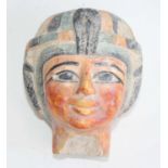 A Grand Tour type Egyptian model of the head of a Pharaoh, having polychrome painted decoration,