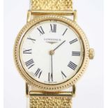 An 18ct yellow gold manual wind lady's Longines wristwatch, having a round white Roman dial and