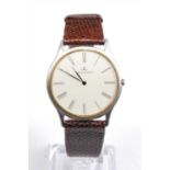 A Gents steel Jaeger le Coultre quartz wristwatch, having round cream Roman dial with yellow inner