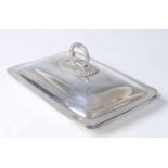 A late Victorian silver shallow entree dish and cover, of plain rectangular form with applied loop