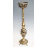 A large cast brass oil lamp stand, having a pierced circular bowl on tapered column to baluster base