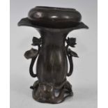 A Japanese Meiji period bronze koro on associated stand, the removable plain circular koro on