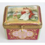 A circa 1900 Vienna porcelain and gilt brass mounted dressing box, the hinged cover finely painted