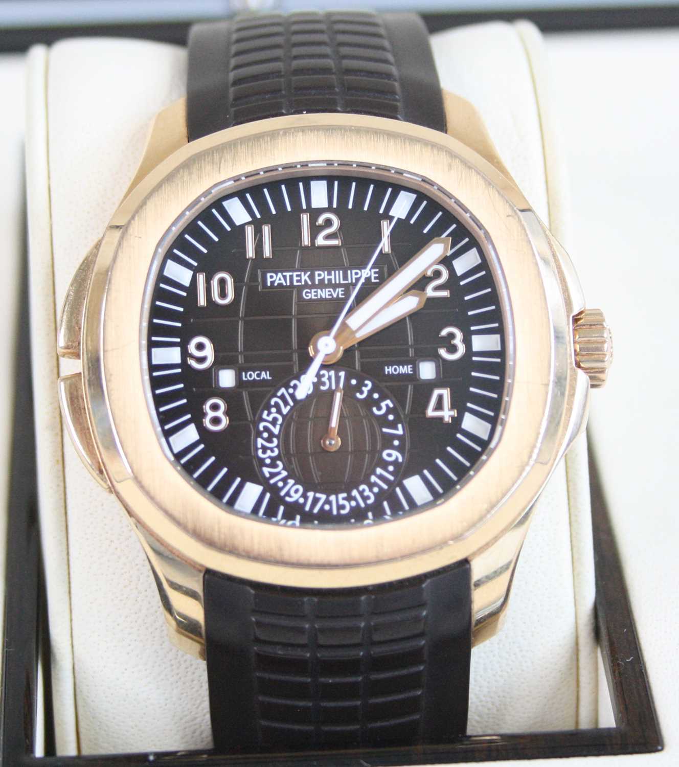 Patek Philippe - a fine gent's 18ct rose gold Aquanaut Travel Time wristwatch, ref. 5164R-001,