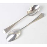 A pair of Georgian Irish silver dessert spoons, of undecorated form in the Old English pattern,